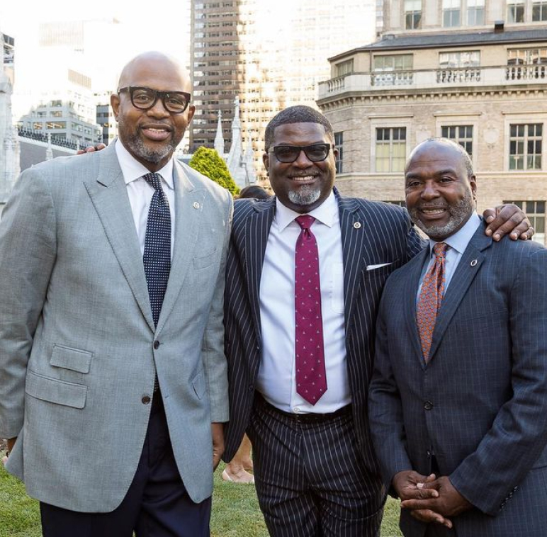 Three businessmen outside